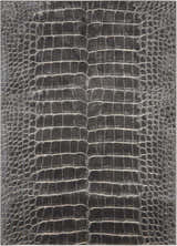 Close-up of the Nourison Maxell Charcoal rug featuring a faux crocodile skin pattern in taupe and charcoal.