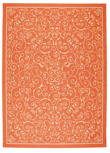 Close-up of Nourison Home & Garden Orange Transitional Area Rug. Burnt orange rug with a white, swirling vine pattern.