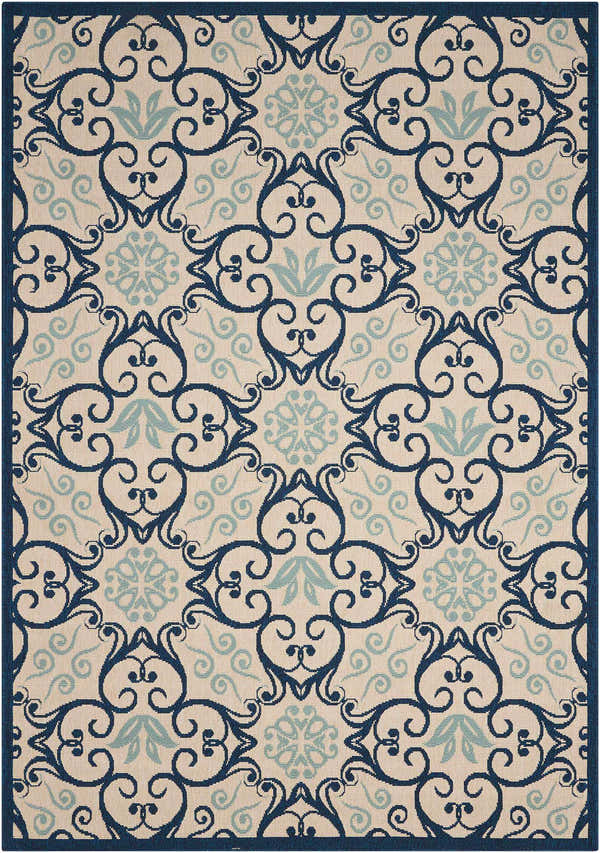 Close-up of the Nourison Caribbean Ivory Navy rug featuring a contemporary floral and scroll pattern.