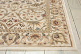 Close-up of the Nourison Walden Ivory Area Rug, showcasing its floral pattern, chestnut accents, and soft texture.