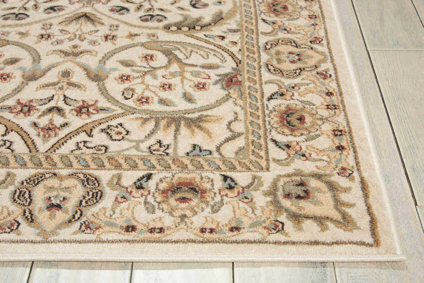 Close-up of the Nourison Walden Ivory Area Rug, showcasing its floral pattern, chestnut accents, and soft texture.