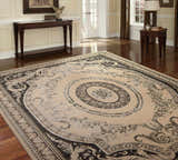 Elegant living room with Michael Amini Platine Ivory Vintage Area Rug, chestnut wood furniture, and natural light.