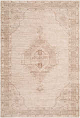 Close-up of the Hanini Area Rug, a beige and taupe hand-tufted rug with a traditional diamond and floral pattern. Design-Rectangle-576