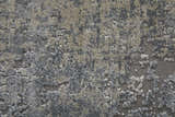 Close-up of the Feizy Cadiz rug. Abstract pattern in taupe, gray, and silver with a soft, textured pile. Texture