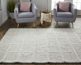 Living room scene with Feizy Berkeley ivory/gray rug, gray chairs, and woven basket. Roomscene-Rectangle