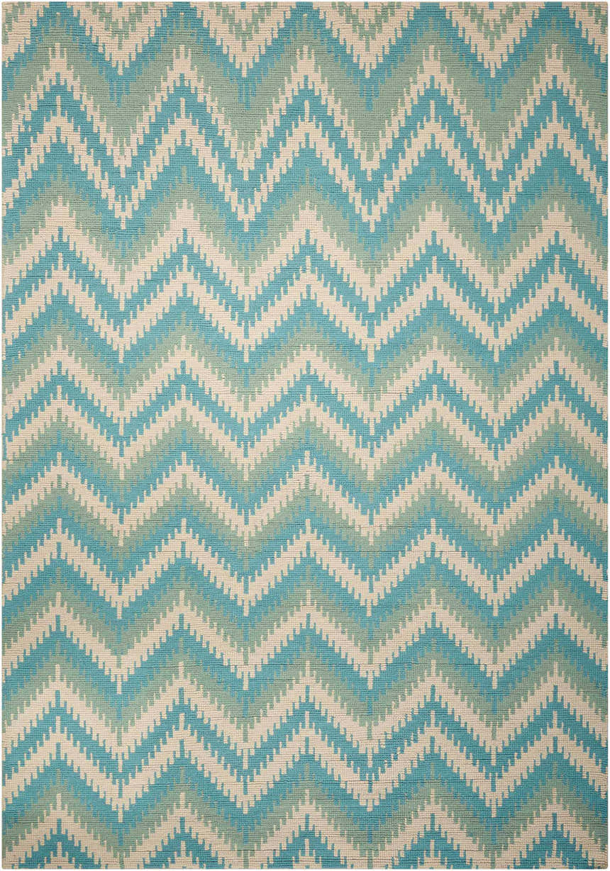 Close-up of the Barclay Butera Prism Pacific Indoor Area Rug, featuring a blue, green, and cream chevron pattern.