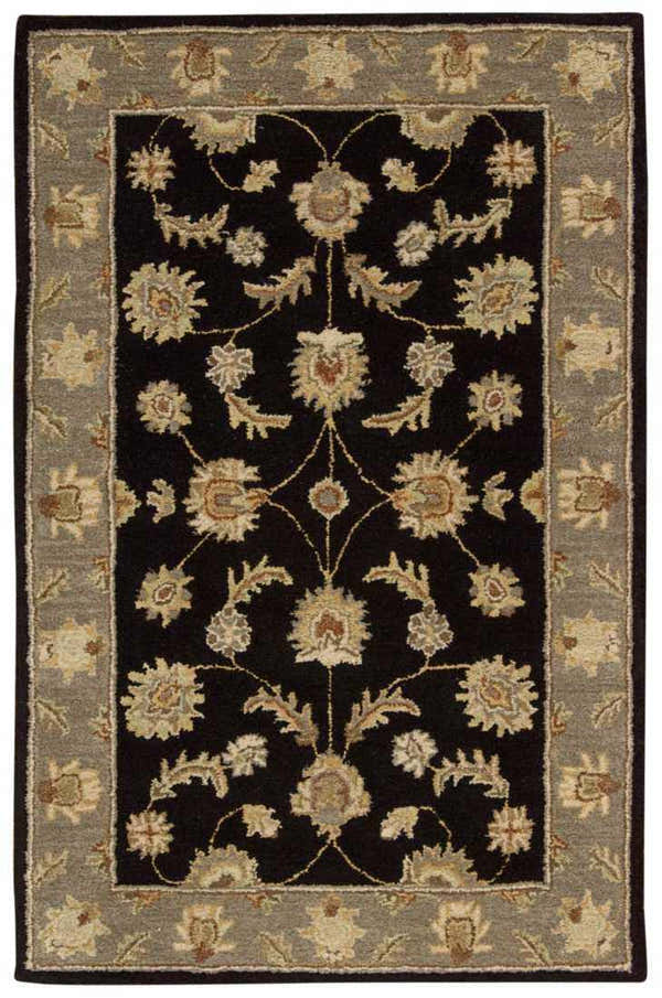 Close-up of the Nourison India House Black Persian rug, featuring a floral design and gray border.