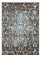Close-up of Nourison Karma Blue Vintage Area Rug. Light blue, white, and brown vintage pattern.
