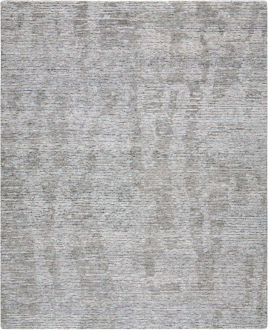 Close-up of the taupe Nourison Ellora Slate rug. Handmade, mid-century modern style with subtle horizontal stripes.