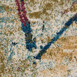 Close-up of Nourison Fusion Cream Multicolor rug. Abstract design with cream, blue, gold, and burgundy hues. Soft, textured pile.