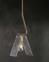 Tan Modern Pendant Light with glass details for kitchen islands or dining areas