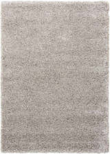 Close-up of a soft, light gray shag texture on the Nourison Amore area rug. Clearance item.