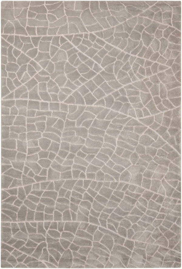 Close-up of the gray Nourison Escalade Granite area rug featuring a unique, abstract cracked pattern.