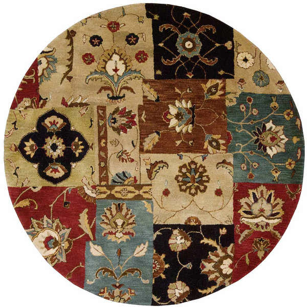 Close-up of a round Nourison Jaipur Multicolor Persian rug with a patchwork floral design in red, teal, beige, brown, and black.