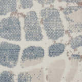 Close-up of Nourison Urban Decor Ivory/Grey rug showing abstract pattern and texture. Chestnut accents.