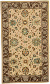 Close-up of Nourison Living Treasures Beige rug, featuring a floral pattern with brown and teal accents on a cream background.