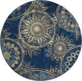 Round Nourison Somerset Denim rug with a mid-century modern floral medallion pattern in denim blue and beige.
