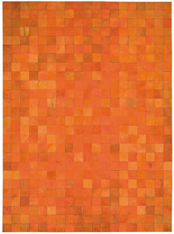 Close-up of the Barclay Butera Medley Tangerine Rug. Modern design with dark orange, woolen cloth, and hair on hide squares.