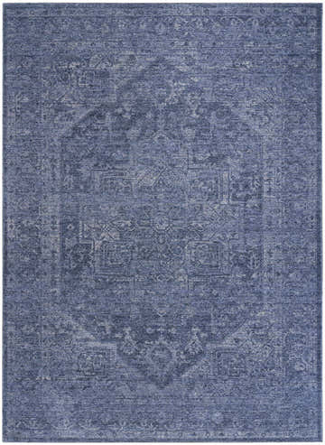Close-up of the DKNY Pure Shades Blue Vintage Indoor Area Rug. Light blue tones with a subtle, distressed vintage pattern.