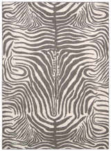 Close-up of Barclay Butera Madagascar Graphite rug featuring a gray and white zebra stripe pattern.