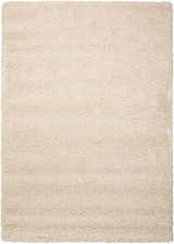 Close-up of the cream-colored, rectangle Nourison Amore Shag Rug. The texture is soft and plush.