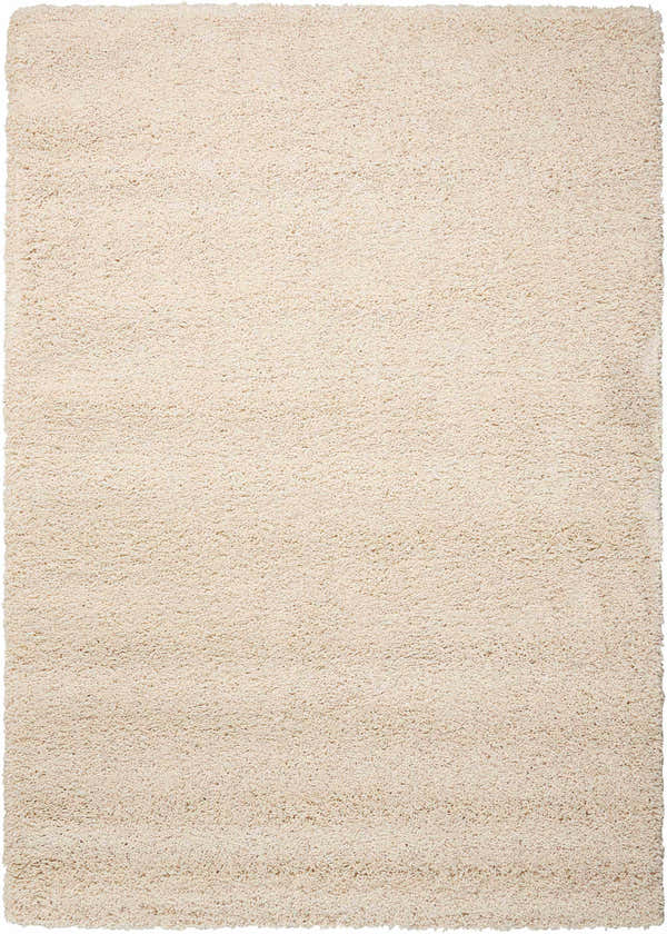 Close-up of the cream-colored, rectangle Nourison Amore Shag Rug. The texture is soft and plush.