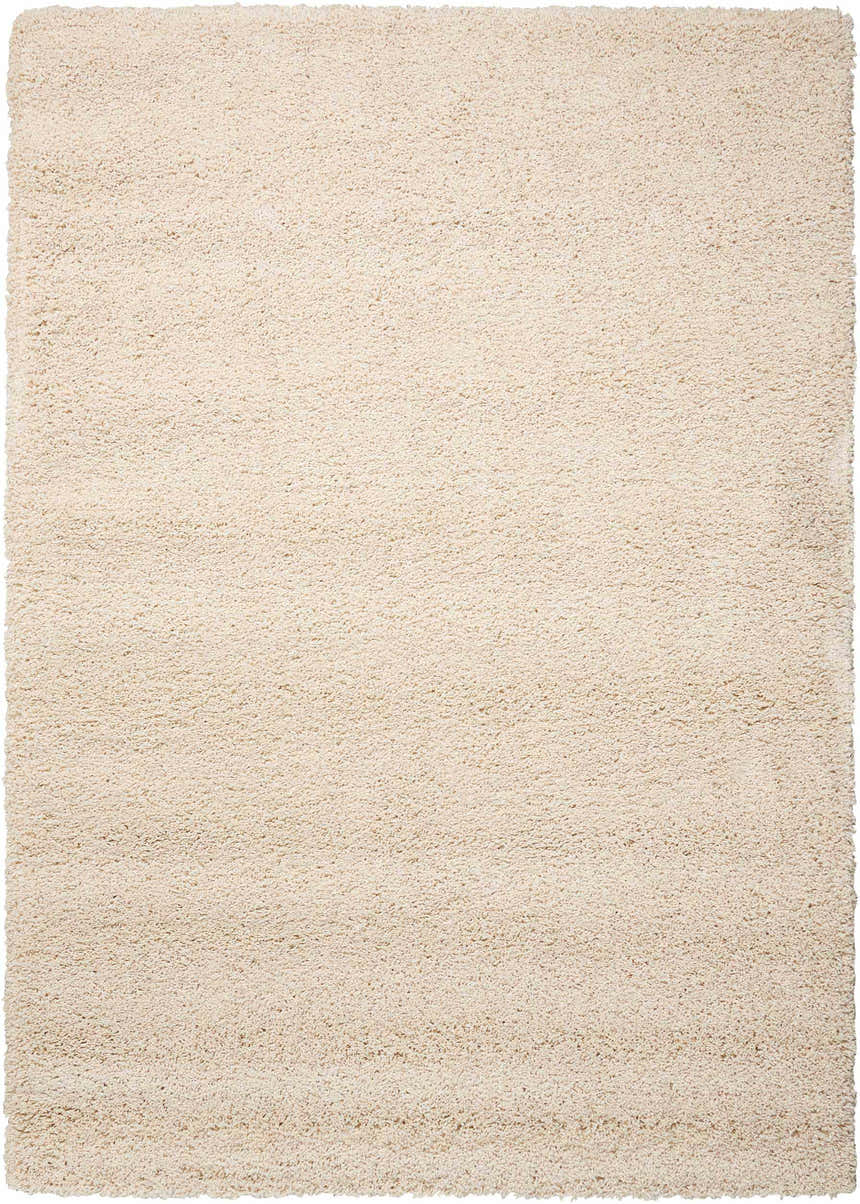 Close-up of the cream-colored, rectangle Nourison Amore Shag Rug. The texture is soft and plush.