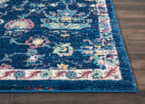 Close-up of Nourison Fusion Navy Pink Persian rug showing floral pattern, texture, and navy border.