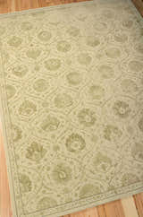 Close-up of the Gravel Nourison Regal Persian Rug. Features a floral pattern in neutral tones, handmade of wool and silk.