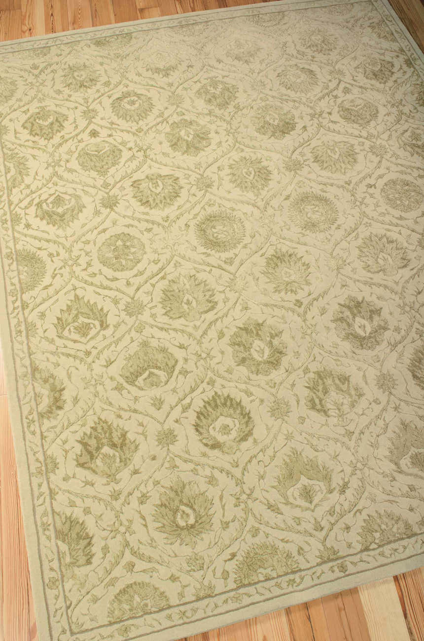 Close-up of the Gravel Nourison Regal Persian Rug. Features a floral pattern in neutral tones, handmade of wool and silk.