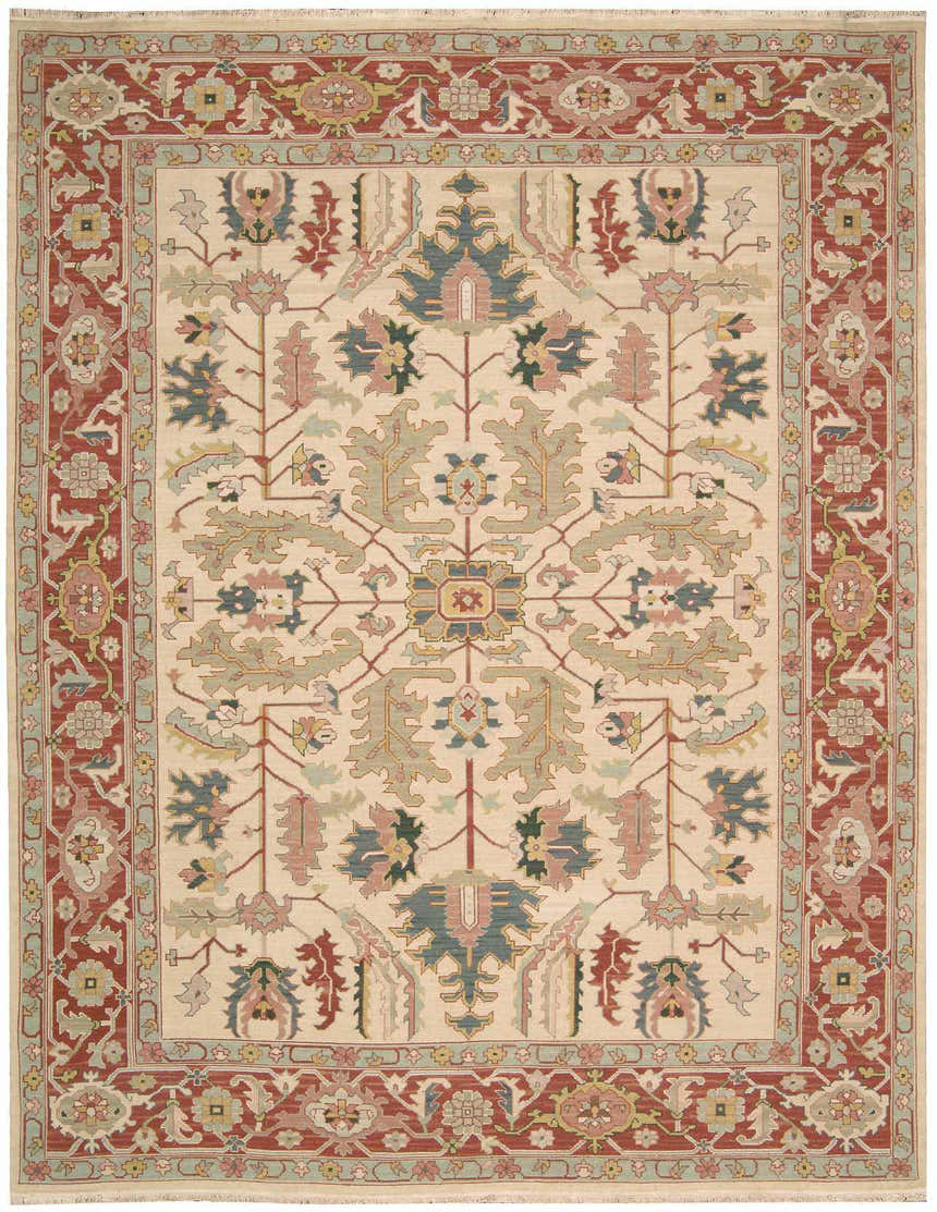 Close-up of the handmade Nourison Nourmak Light Gold Vintage Area Rug, featuring a floral pattern and red border.