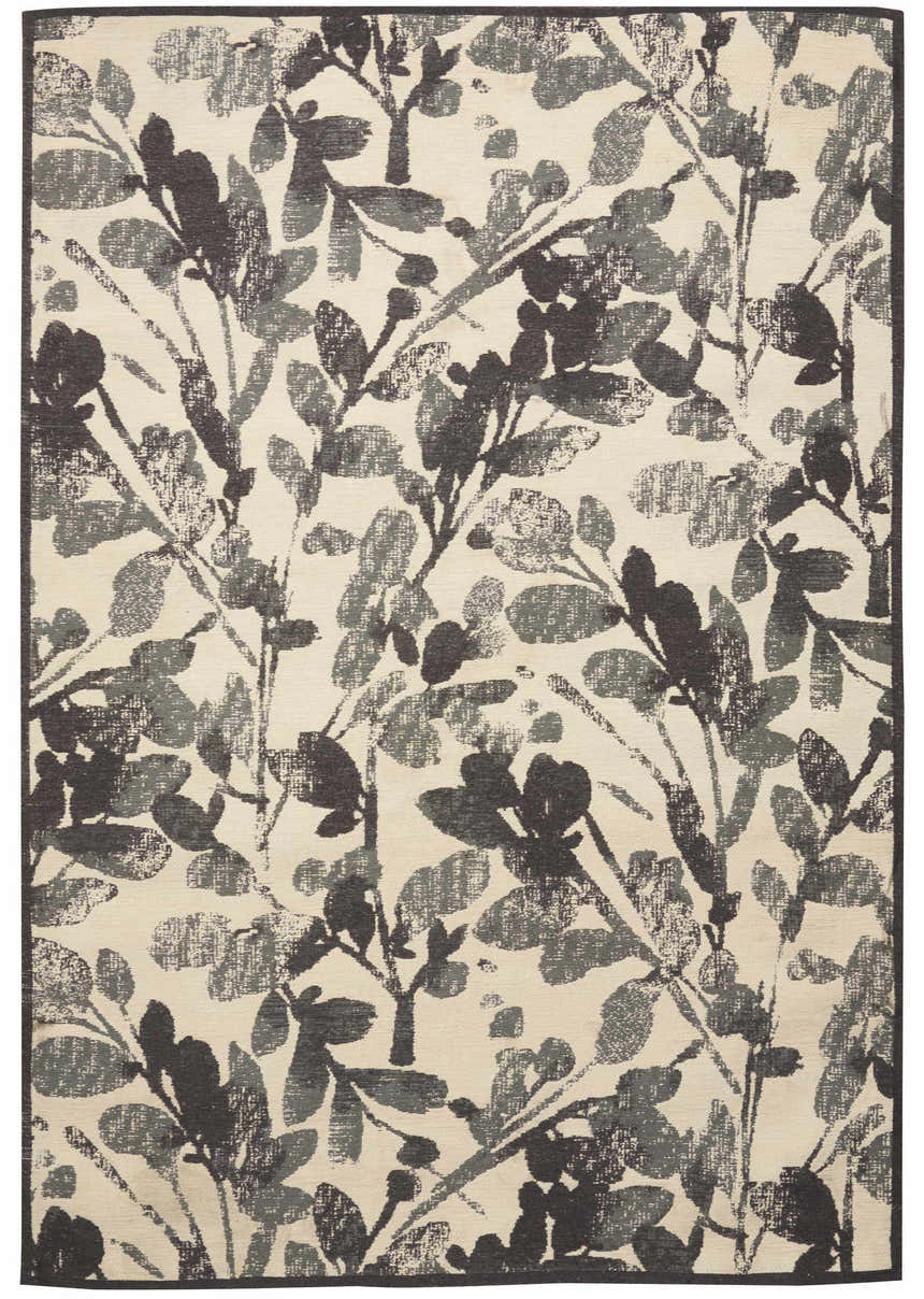 Close-up of Waverly Vintage Lux Graphite rug. Modern design with a graphite floral pattern on a light background.