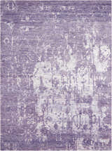 Close-up of the Nourison Silk Shadows Amethyst Vintage Area Rug, showcasing its purple hues and distressed vintage pattern.