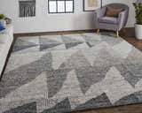 Living room scene with a Feizy Alford ivory, gray, and taupe geometric wool rug, white sofa, and gray chair. Roomscene-Rectangle
