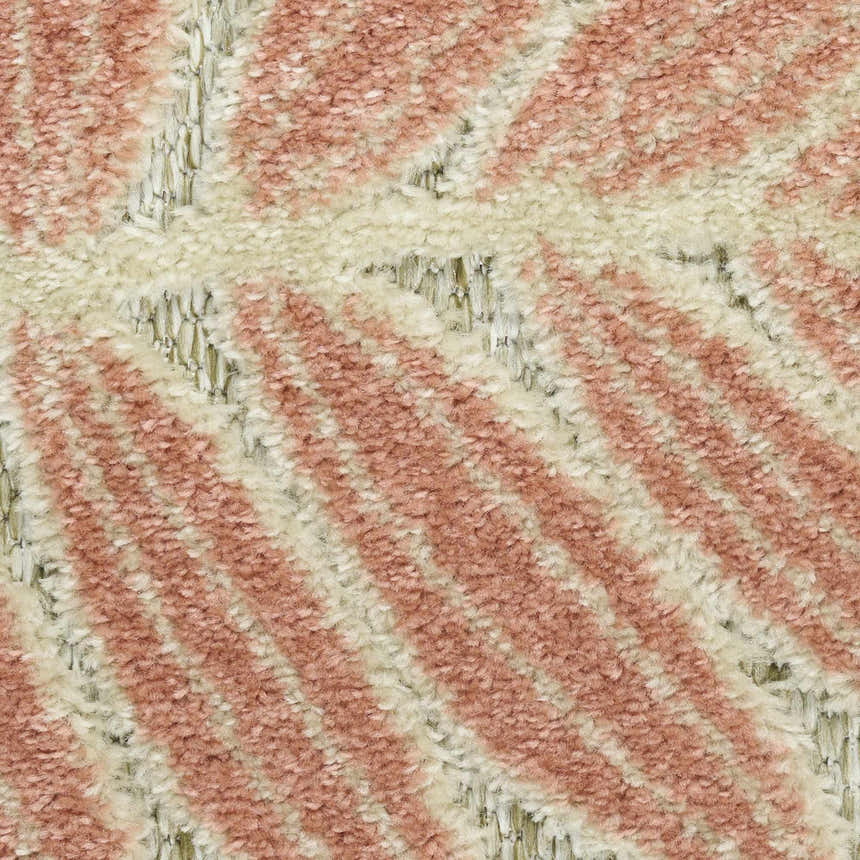 Close-up of the Nourison Aloha Sage Rose rug showing its rose and ivory diagonal stripe pattern and textured pile.