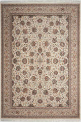 Close-up of a cream Persian rug. Intricate floral pattern with brown, gold, and blue accents. Nourison Persian Palace Cream rug.