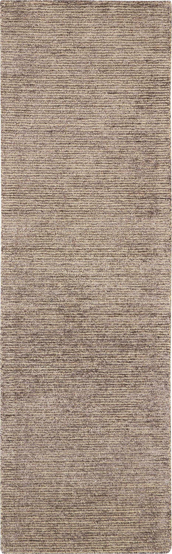 Close-up of the Nourison Weston Charcoal rug. Taupe color with a subtle horizontal stripe texture. Handmade rug.