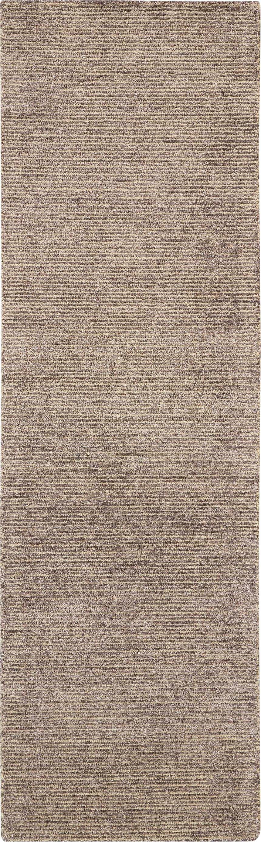 Close-up of the Nourison Weston Charcoal rug. Taupe color with a subtle horizontal stripe texture. Handmade rug.