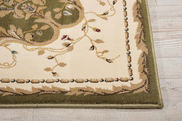 Close-up of the Nourison Bordeaux Sage Aubusson Rug, featuring a floral pattern in muted sage, charcoal, and cream.