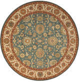 Close-up of Nourison Living Treasures Aqua rug. Round shape, traditional floral pattern in aqua, tan, and red tones.