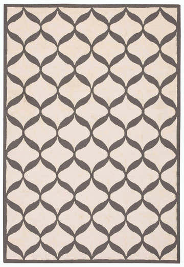 Close-up of Nourison Decor White/Light Grey rug. Handmade polyester rug with a gray quatrefoil pattern on a cream background.