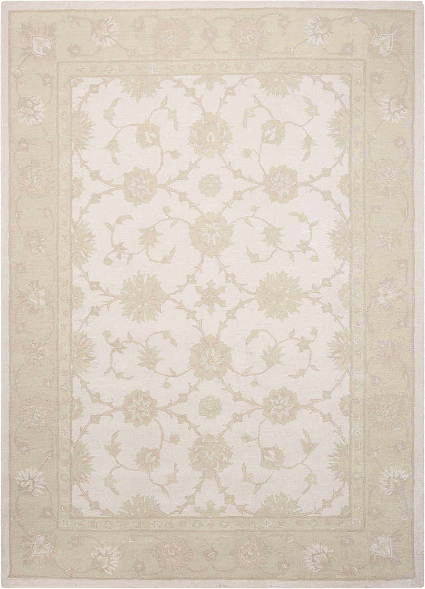 Close-up of the Nourison Zephyr Ivory/Green Area Rug. Floral pattern with chestnut accents and handmade wool texture.