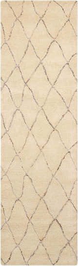 Close-up of Barclay Butera Intermix Sand rug. Handmade wool rug with a diamond trellis pattern and textured pile.