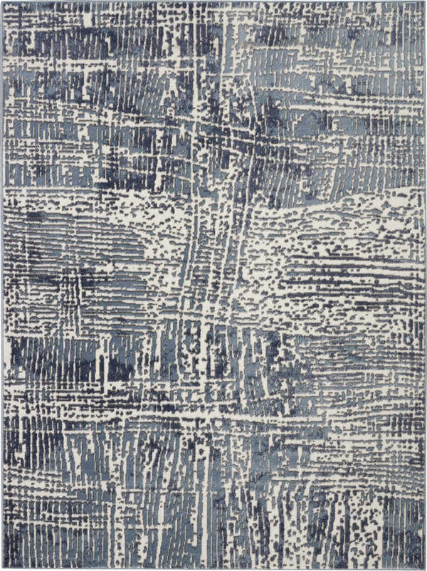 Close-up of the Nourison Urban Decor Slate/Ivory rug, featuring a modern, abstract pattern in shades of blue and ivory.
