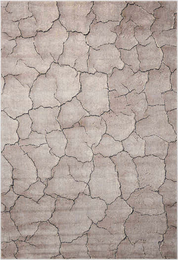 Close-up of Nourison Utopia Granite rug; gray with a unique cracked earth pattern and soft, subtle texture.