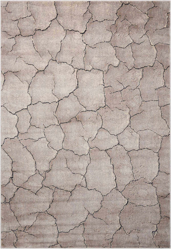 Close-up of Nourison Utopia Granite rug; gray with a unique cracked earth pattern and soft, subtle texture.