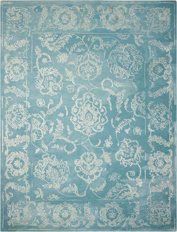 Close-up of the Nourison Opaline Aqua Vintage Area Rug, featuring a floral pattern and border on a soft blue background.