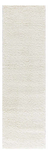 Close-up of the plush Nourison Malibu Shag Ivory rug. Soft, dense pile with subtle texture.