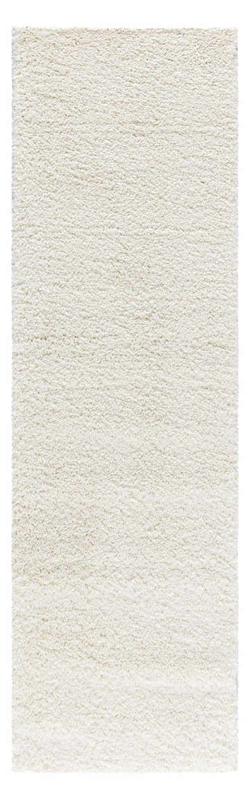 Close-up of the plush Nourison Malibu Shag Ivory rug. Soft, dense pile with subtle texture.