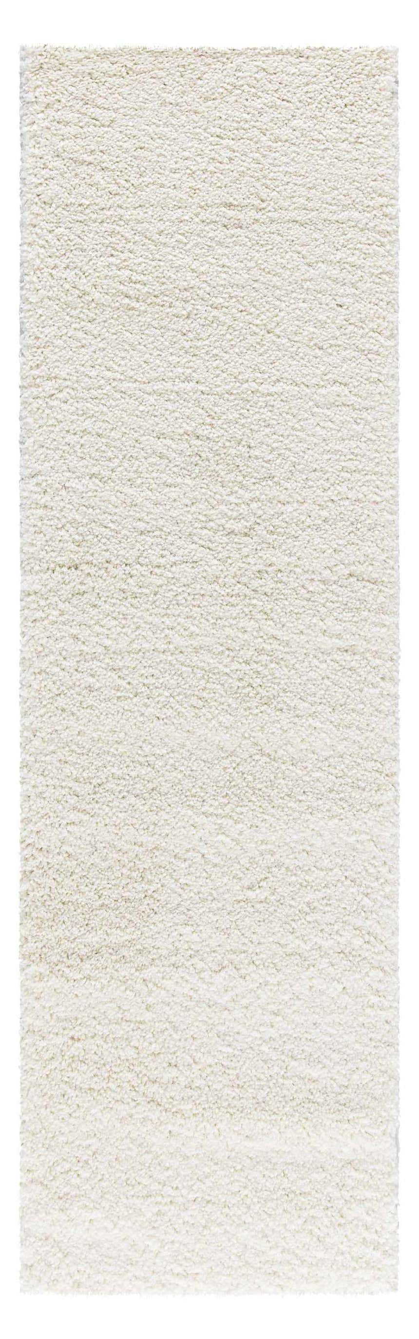 Close-up of the plush Nourison Malibu Shag Ivory rug. Soft, dense pile with subtle texture.